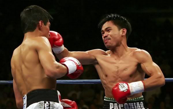 ASIAN MAN MANNY PACQUIAO PACMAN ERIK MORALES EL TERRIBLE BOXING FIGHT WHITE GIRL Pictures, Images and Photos