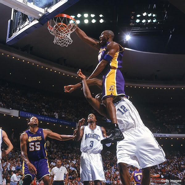 kobe bryant dunks on dwight howard video. …but Dwight Howard is standing